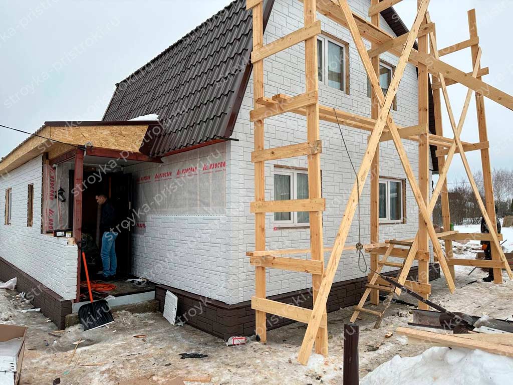 Утепление дома и монтаж фасада под белый камень